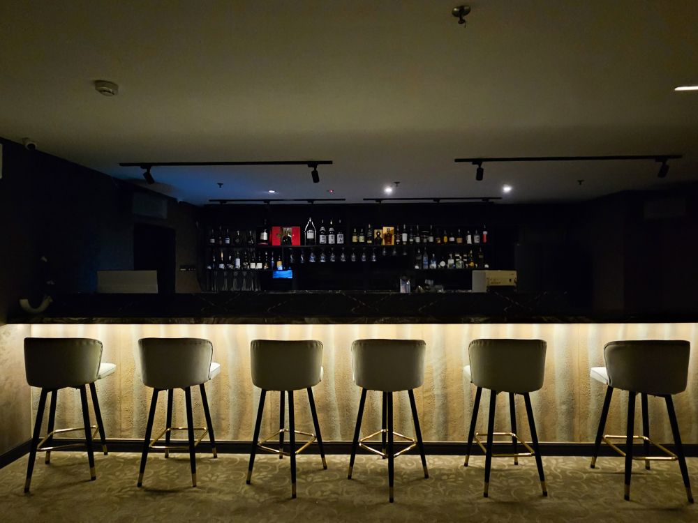 Bar counter with stylish stools