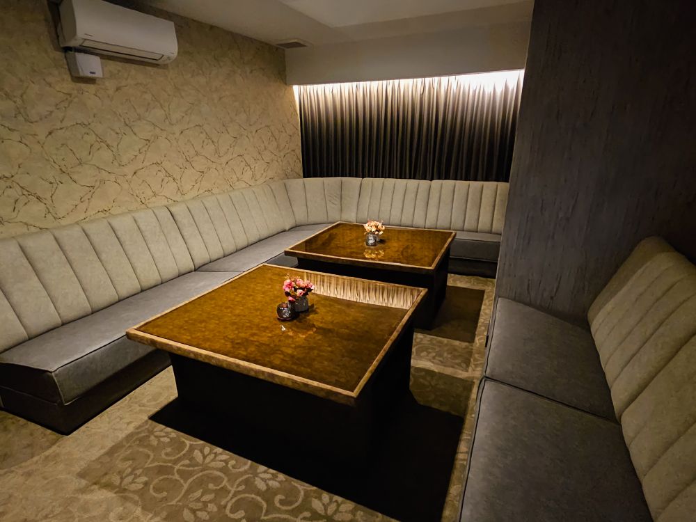 Private VIP room with sofa seating
